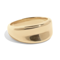 Packshot of a wide gold band ring with a smooth, polished finish, offering a bold and timeless style
