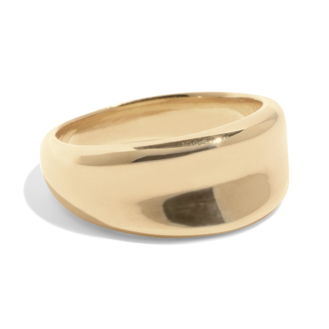 Packshot of a wide gold band ring with a smooth, polished finish, offering a bold and timeless style
