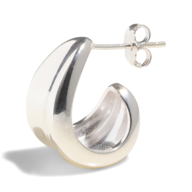 Packshot of a chunky silver hoop earring with a smooth, polished finish, perfect for a bold fashion statement.