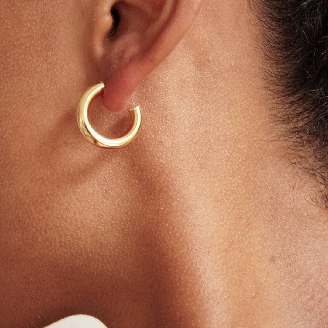 Bold gold hoop earring