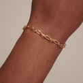 Chain gold bracelet around wrist