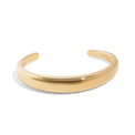 Gold cuff bracelet on packshot, also known as a gold bangle bracelet