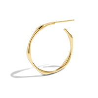 Packshot of uneven organic shaped gold hoop earrings