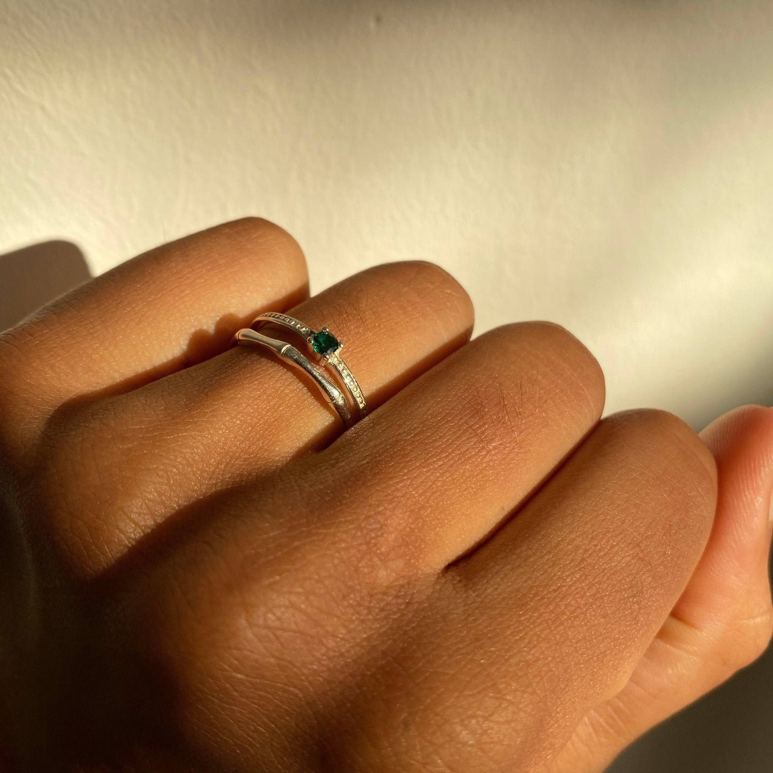 a close up of a person holding a pair of scissors 